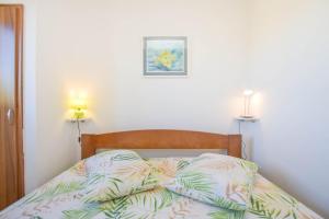 Postel nebo postele na pokoji v ubytování House Oliver