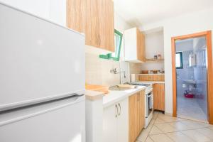 Kuchyň nebo kuchyňský kout v ubytování House Oliver