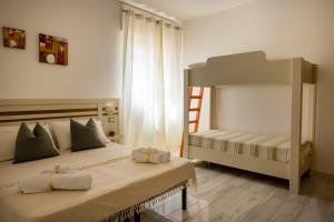 Krevet ili kreveti na kat u jedinici u objektu Modsalento - Rooms and breakfast