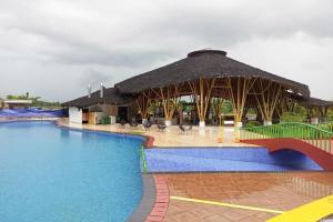 The swimming pool at or close to Urbanview Hotel Belitung Lodge Resto & Club House by RedDoorz