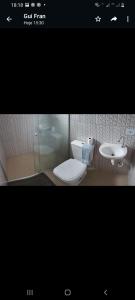 Ett badrum på Suites Chacara Madu