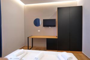 TV a/nebo společenská místnost v ubytování The View Hotel Ksamil