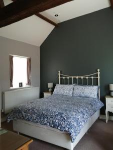 Säng eller sängar i ett rum på Risley Guest House