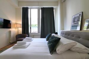 Posteľ alebo postele v izbe v ubytovaní PRESTIGE BOUTIQUE HOMES - Garden & Pool