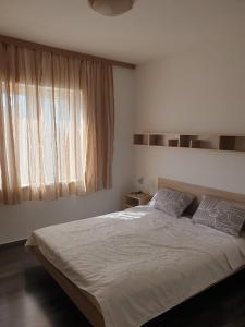 Postel nebo postele na pokoji v ubytování Apart hotel St.Pijerre