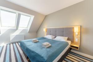 Postel nebo postele na pokoji v ubytování Bel Mare 426D by Renters