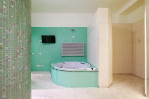 Kúpeľňa v ubytovaní PRESTIGE BOUTIQUE HOMES - Garden & Pool