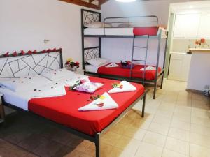 Posteľ alebo postele v izbe v ubytovaní Elsa Hotel