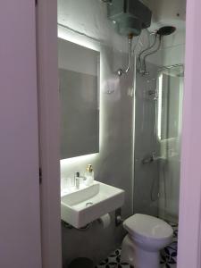A bathroom at Mid century character house in Argostoli