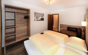 Posteľ alebo postele v izbe v ubytovaní Appartements Zwölferkogelblick