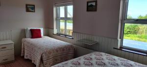 Voodi või voodid majutusasutuse Teac Campbell Guesthouse toas