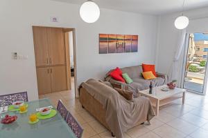 Posezení v ubytování Mythical Sands Resort & Spa, Evilion Apartment
