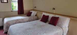 Voodi või voodid majutusasutuse Teac Campbell Guesthouse toas