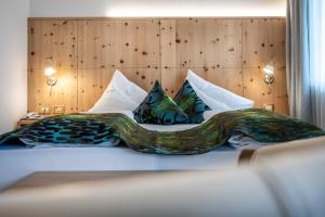 Postel nebo postele na pokoji v ubytování Hotel Schmung