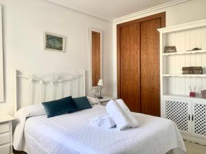 Giường trong phòng chung tại Torremar Natura Julia