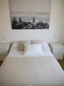 Ένα ή περισσότερα κρεβάτια σε δωμάτιο στο Precioso apartamento en primera linea de playa