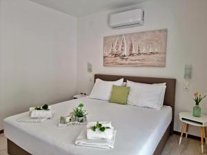 Posteľ alebo postele v izbe v ubytovaní Apartments DaMa
