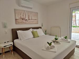 Posteľ alebo postele v izbe v ubytovaní Apartments DaMa