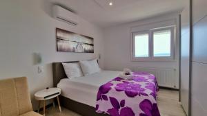 Posteľ alebo postele v izbe v ubytovaní Apartments DaMa