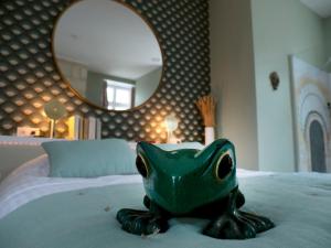 Łóżko lub łóżka w pokoju w obiekcie Château Fleur D'Aya