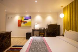 Postel nebo postele na pokoji v ubytování Meraki Holistic Wellness Retreat