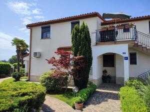 Vonkajšia záhrada v ubytovaní Apartments Norma