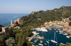 an aerial view of a harbor with boats in the water at Hotel Piccolo Portofino in Portofino