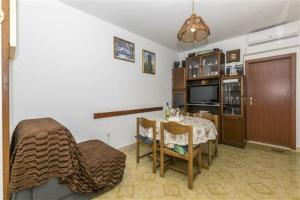 Televízia a/alebo spoločenská miestnosť v ubytovaní Seaview Escape Stanići