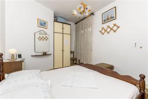 Posteľ alebo postele v izbe v ubytovaní Seaview Escape Stanići