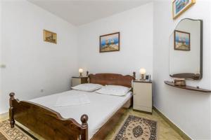 Posteľ alebo postele v izbe v ubytovaní Seaview Escape Stanići