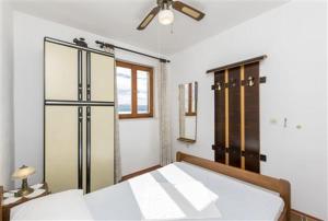Posteľ alebo postele v izbe v ubytovaní Seaview Escape Stanići