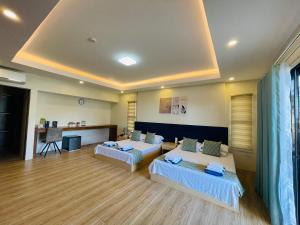 FIG Sunset View Resort客房内的一张或多张床位