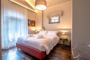 A bed or beds in a room at Il Pradicciolo Agriturismo