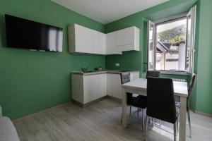 Kuchyň nebo kuchyňský kout v ubytování Residence Il Muretto