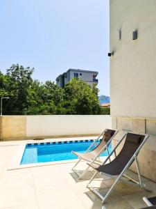 Bazén v ubytování Garni Hotel Larimar nebo v jeho okolí