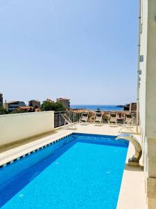 Bazén v ubytování Garni Hotel Larimar nebo v jeho okolí