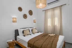 Posteľ alebo postele v izbe v ubytovaní Kallia's Suites Milos + 37 fotografií