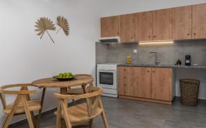 Kuchyň nebo kuchyňský kout v ubytování Kallia's Suites Milos