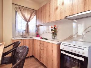 A kitchen or kitchenette at Traounou Serenity Villa