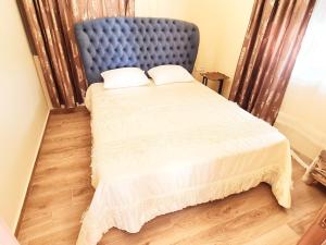 A bed or beds in a room at Traounou Serenity Villa