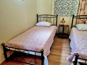 A bed or beds in a room at Traounou Serenity Villa