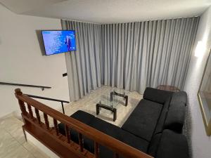 Telewizja i/lub zestaw kina domowego w obiekcie Fantastic Bungalow Playa de Las Américas
