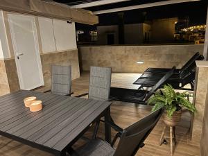 Posezení v ubytování Luxury 190m2 Amplio apartamento moderno con terraza en la azotea de 50m2 junto a la playa, en el centro de Torre del Mar, Málaga, Modern large apartment with 50m2 roof terrace by the beach, right in the center of Torre del Mar, Malaga