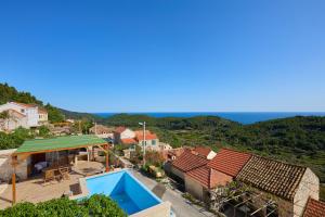 a villa with a view of the ocean at STIGA 4 - new 2 bedroom apartment in Babino Polje
