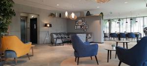 Appart Hotel Odalys City Toulouse Blagnac Aéroport的休息区