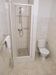 Kúpeľňa v ubytovaní BEST Hotel Garni