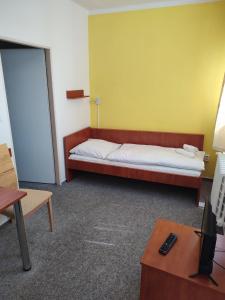 Cama o camas de una habitación en BEST Hotel Garni