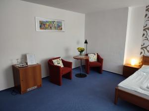 Posteľ alebo postele v izbe v ubytovaní BEST Hotel Garni