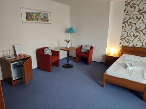 Posteľ alebo postele v izbe v ubytovaní BEST Hotel Garni