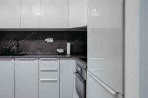 Kuchyňa alebo kuchynka v ubytovaní St. Antoni Suite 7